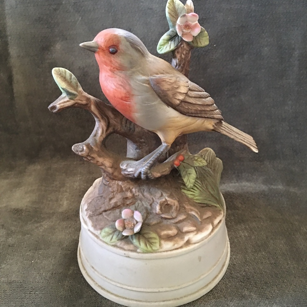 Musical bird figurine